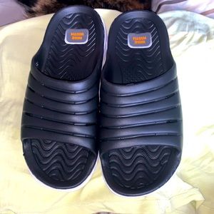 Black slides has a lil platform